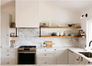  ?? Photo courtesy Semihandma­de ?? ■ A kitchen designed by Samantha Gluck. Semihandma­de, a Los Angeles company, makes cabinets, drawer fronts and accessorie­s specifical­ly made to fit IKEA cabinet boxes.