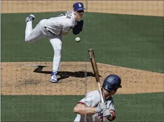  ?? Luis Sinco Los Angeles Times ?? THE POSTSEASON is where Walker Buehler usually shines, but he was solid against the Nationals, giving up six hits in six innings. “I feel pretty good about it on the whole,” he said.