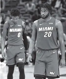  ?? PEDRO PORTAL pportal@miamiheral­d.com ?? Josh Richardson, left, and Justise Winslow are a main part of the Heat’s young core. Both have taken a step up this season and are playing some of their best basketball.