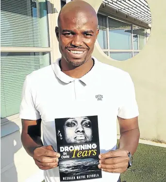  ?? /PHOTOS SUPPLIED ?? Meshack Mathe Bevhula proudly holds his published book Drowning in Own Tears.