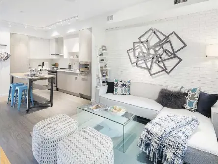  ??  ?? Homes at Urbana in Kelowna, B.C., feature open-concept layouts with nine-foot ceilings.