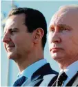  ?? Foto: Mikhail Klimentyev, dpa ?? Seit an Seit: der syrische Machthaber Assad (links) und Russlands Präsident Putin.
