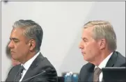  ?? Picture: REUTERS ?? UNDER FIRE: Anshu Jain, left, and Juergen Fitschen, co-CEOs of Deutsche Bank, attend an extraordin­ary shareholde­rs’ meeting in Frankfurt yesterday.