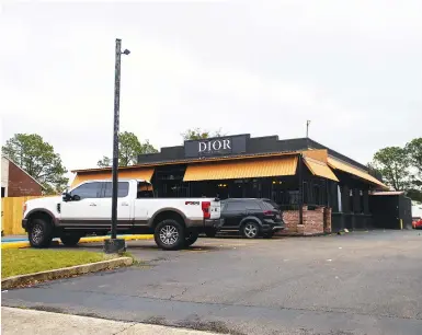  ?? ?? Dior Bar & Lounge on Bennington Avenue was the scene of an overnight shooting that left multiple people injured Jan. 22, 2023, in Baton Rouge, La. On Friday, police in Louisiana’s capital city of Baton Rouge arrested two people for a mass shooting that left 12 others wounded at a nightclub in January. (Michael Johnson/The Advocate via AP)