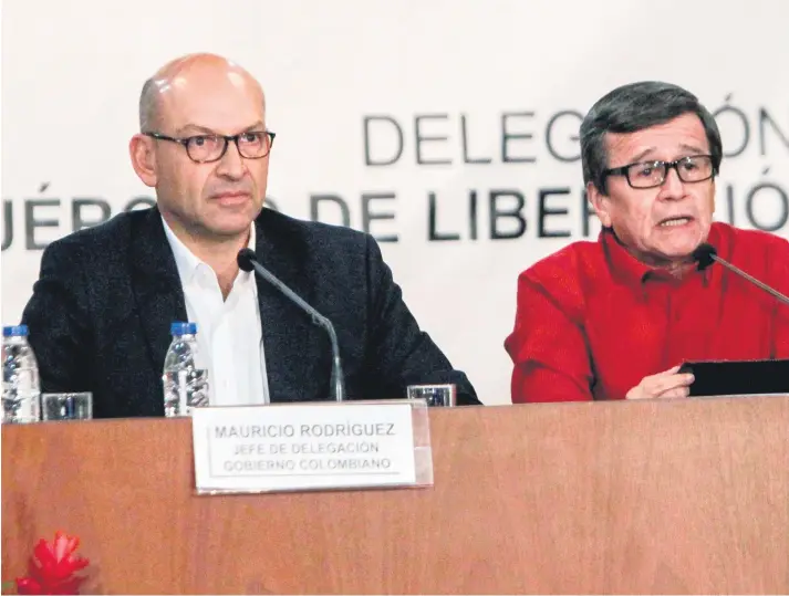  ?? Picture: EPA ?? PEACEMAKER­S. Head of the Colombian government delegation Mauricio Rodriguez, left, and National Liberation Army delegate Pablo Beltran are meeting this week with the aim to end a 53year conflict that has killed more than 260 000 people.