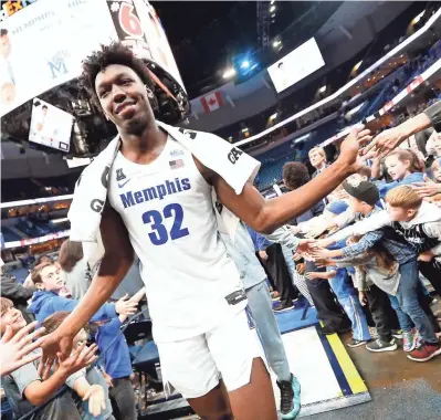  ?? JOE RONDONE/THE COMMERCIAL APPEAL ?? Memphis center James Wiseman walks off the court after their season-opening 97-64 win over South Carolina State on Tuesday.