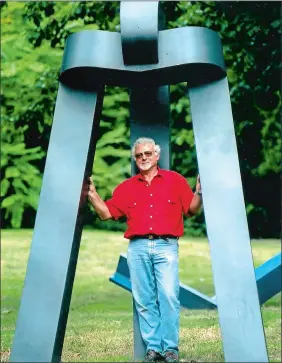  ?? SEAN D. ELLIOT/THE DAY ?? David Smalley with his 1979 sculpture “Warlock III.”