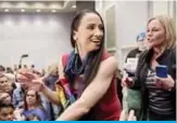  ?? — AFP ?? OLATHE, Kansas: Democratic candidate for Kansas’ 3rd Congressio­nal District Sharice Davids greets supporters during an election night party on Tuesday.