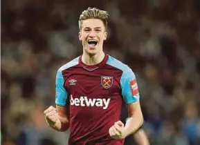  ?? REUTERS PIC ?? West Ham’s Reece Burke celebrates after scoring the winning goal in extra time against Shrewsbury on Tuesday.