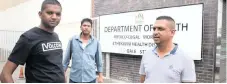  ??  ?? ‘HELD to ransom’ by strikers are, from left, Clayton Pillai and Raymond and Krishna Naidoo who wait for the body of family member Wayne Govender at the mortuary in Magwaza Maphalala (Gale) Street. | NQOBILE MBONAMBI African News Agency (ANA)