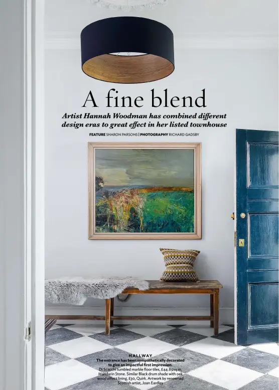  ??  ?? HALLWAY
The entrance has been sympatheti­cally decorated to give an impactful first impression.
Di Scacchi tumbled marble floor tiles, £44.89sq m, Mandarin Stone. Similar Black drum shade with oak wood effect lining, £30, Quirk. Artwork by renowned Scottish artist, Joan Eardley