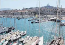  ?? FOTOS: DPA ?? Der alte Hafen ist das Herz Marseilles.