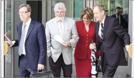  ?? TOM MCCARTHY JR. / FOR AMERICAN-STATESMAN ?? Tim Wright (center), a Williamson County judge, exits the federal courthouse in Austin on Thursday after pleading guilty on two felony counts.