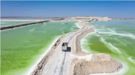  ?? QILAI SHEN/NEW YORK TIMES FILE PHOTO ?? Brine ponds at Chaerhan Salt Lake in Golmud, China, are a source of lithium, magnesium and potassium