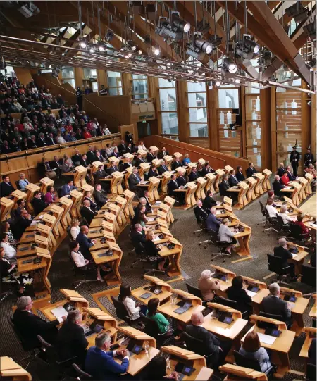  ??  ?? The Queen addresses the Scottish Parliament, but the future of the Union will play a prominent part in the fight for votes when Scotland goes to the polls on May 6
