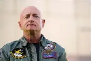  ?? AP PHOTO/ROSS D. FRANKLIN ?? Sen. Mark Kelly, D-Ariz., waits to speak during a news conference in November at the Arizona Capitol in Phoenix.