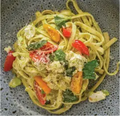  ??  ?? BELOW Celebrity chef Jax Hamilton has created some mouth-watering recipes, including this fettuccine, pesto, feta and cherry tomatoes recipe, which can be found on our website latitudema­gazine.co.nz