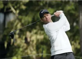  ?? ERIC RISBERG — THE ASSOCIATED PRESS ?? Paul Casey, of England, follows his drive from the 18th tee of the Spyglass Hill Golf Course during the third round of the AT&amp;T Pebble Beach Pro-Am golf tournament, Saturday in Pebble Beach