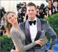  ?? CHARLES SYKES/INVISION/AP ?? Supermodel Gisele Bundchen and her quarterbac­k husband Tom Brady attend a gala in New York on May 1. Bundchen claims the New England Patriots superstar played through a concussion last year on his way to winning his fifth Super Bowl title.