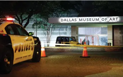  ?? (Elias Valverde Ii/dallas Morning NEWS/TNS) ?? A Dallas police car sits outside the Dallas Museum of Art after the June 1 break-in. Newly released 911 calls exclusivel­y obtained by The Dallas Morning News provide the clearest picture yet of what happened in a crucial security failure at the museum.
