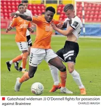  ?? CHARLES WAUGH ?? Gateshead wideman JJ O’Donnell fights for possession against Braintree