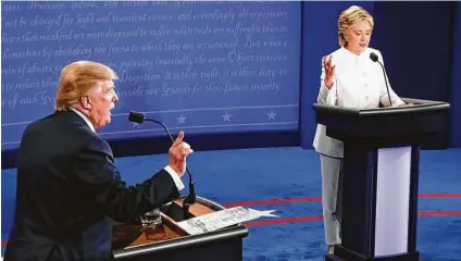  ?? Mark Ralston / AFP | Getty Images ?? Wednesday night’s presidenti­al debate between Donald Trump and Hillary Clinton began cordially but quickly turned caustic.