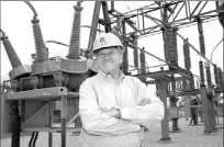  ??  ?? Peter Cartwright stands next to part of a Calpine facility in Pasadena, Texas, in 1999.