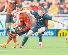  ?? ?? United striker Nicky Clark tussling with Ross County’s Jack Burroughs, above, and Harry Paton, below.