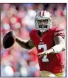  ?? AP file photo ?? Colin Kaepernick, shown with the San Francisco 49ers in 2013, and Eric Reid filed collusion grievances against the NFL, saying they were blackliste­d because of protests during the national anthem at games.