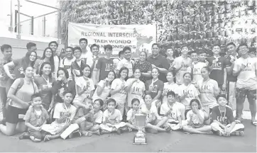  ??  ?? Team UC celebrates after topping the sparring event of the Regional Inter-School Taekwondo Championsh­ips over the weekend at the Times Square in Barangay Talamban, Cebu City.