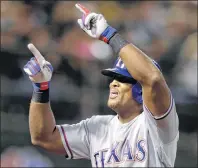  ?? AP PHOTO/BEN MARGOT, FILE ?? In this Sept. 23, 2016, file photo, Texas Rangers’ Adrian Beltre celebrates after hitting a two-run home run against the Oakland Athletics in the seventh inning of a baseball game in Oakland, Calif.