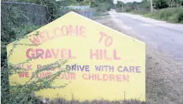  ?? PHOTO BY NATHANIEL STEWART ?? The deplorable section of road leading to the Gravel Hill community in Clarendon.