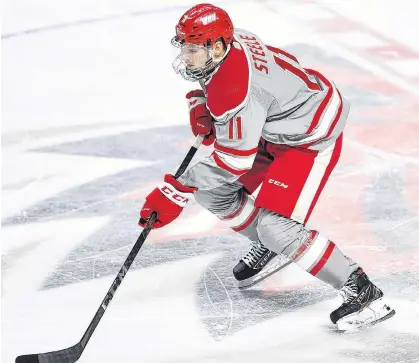  ?? STEVE MCLAUGHLIN • SPECIAL TO THE GUARDIAN ?? Stratford’s Ryan Steele is a third-year centre with the Sacred Heart University Pioneers men’s hockey team.