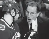  ?? DARRYL DYCK/ THE CANADIAN PRESS ?? Vancouver Canucks head coach John Tortorella says he feels he has let down his friend and former GM Mike Gillis with the disappoint­ing play of the team this year.