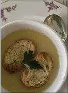  ?? ?? Jacques’ Economical Garlic Soup can be served with croutons made from sliced baguette. No cream is used.
