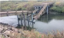  ?? DUANE HICKS VIA THE CANADIAN PRESS ?? The Dyck Memorial Bridge in the Rural Municipali­ty of Clayton opened to traffic Sept. 14 and collapsed into the Swan River later that day.