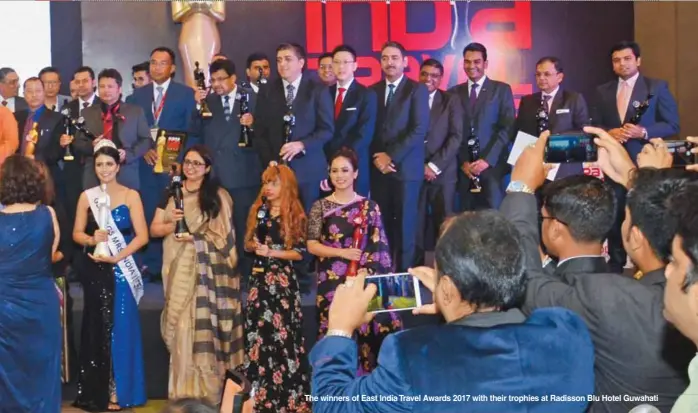  ??  ?? The winners of East India Travel Awards 2017 with their trophies at Radissonss­on Blu Hotel Guwahati