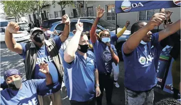  ?? Picture: Esa Alexander ?? DA leader John Steenhuise­n leads his party’s campaign in Langa, Cape Town, during the voter registrati­on weekend. The Independen­t Electoral Commission said about 23,000 registrati­on sites had opened across the country.