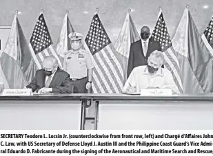  ?? DFA-OPCD/PHILIP FERNANDEZ ?? SECRETARY Teodoro L. Locsin Jr. (counterclo­ckwise from front row, left) and Chargé d’affaires John C. Law, with US Secretary of Defense Lloyd J. Austin III and the Philippine Coast Guard’s Vice Admiral Eduardo D. Fabricante during the signing of the Aeronautic­al and Maritime Search and Rescue, or AMSAR, Agreement