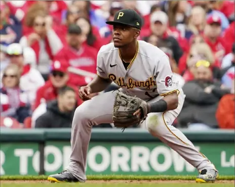  ?? Associated Press ?? Ke'Bryan Hayes takes up his position in the first inning in Thursday’s opener against the Cardinals in St. Louis before being forced to leave by what turned out to be a forearm spasm.