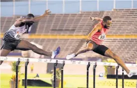  ?? FILE ?? Jaheel Hyde (right) forces Akeem Mowatt to keep up with him in the men’s 400m event at the JAAA National Senior Championsh­ips at the National Stadium in Kingston on Friday, June 24.