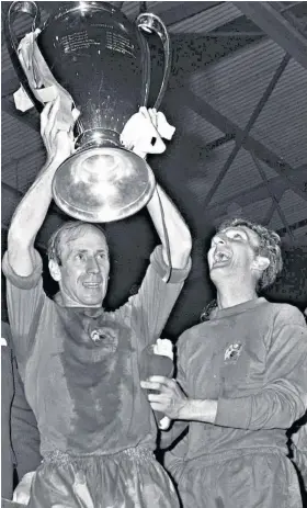  ??  ?? Glorious history: Bobby Charlton, one of Manchester United’s greatest youth products, lifts the European Cup at Wembley Stadium in 1968 (left), while a United squad based on homegrown talent celebrate winning the trophy 31 years later at the Nou Camp in Barcelona (right)