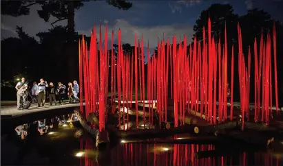  ?? Photos by New York Botanical Garden ?? Seattle-based glass artist Dale Chihuly's work is on display through Oct. 28 at the New York Botanical Garden.