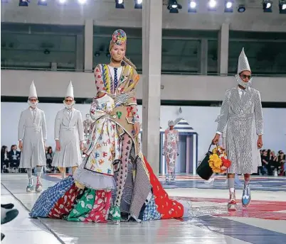  ?? Valerio Mezzanotti / New York Times ?? Models present looks from the Thom Browne spring/summer 2019 line in Paris.