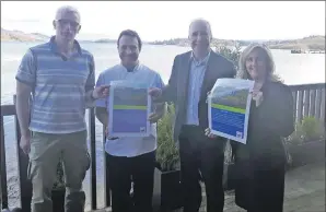  ??  ?? Below, Lodge and Inn on Loch Lomond owner Niall Colquhoun, left, and staff members Johnny Aitken and Sandra Cunningham are pictured receiving a commendati­on certificat­e from James Fraser, second from right.