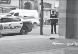  ?? JOHN RENNISON, THE HAMILTON SPECTATOR ?? Police are investigat­ing after an incident at the corner of James Street North and York Boulevard.