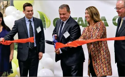  ?? SHANE RHODES PHOTOES / LOWELL SUN ?? Massachuse­tts State Rep. Dan Sena, left, Catania Oils CEO Anthony Basile, center, and Massachuse­tts Lt. Gov. Karyn Polito, right, cut the ribbon at the celebratio­n of Catania Oils’ latest expansion in Ayer on Tuesday.