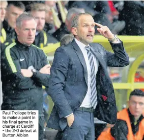  ??  ?? Paul Trollope tries to make a point in his final game in charge at Cardiff – the 2-0 defeat at Burton Albion