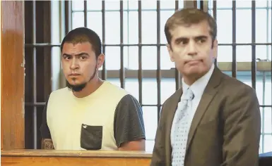  ?? STAFF PHOTO BY NICOLAUS CZARNECKI ?? FACEBOOK FACTOR: Gerardo Elenilson Portillo, at left with lawyer Nitin Dalal yesterday in East Boston Municipal Court, was picked up by police, who used Facebook to help identify him as a suspect in a Winthrop sexual assault.