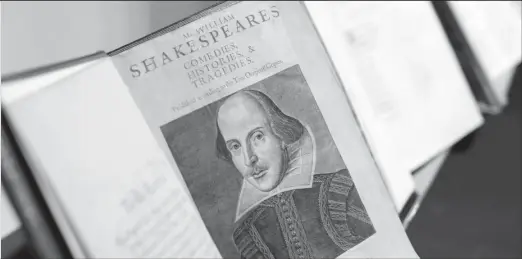  ?? ?? William Shakespear­e’s First Folio on display at Christies in London, April 24, 2023. Considered one of the most important books, it was published in 1623, the exhibition marks the 400-year anniversar­y. REUTERS